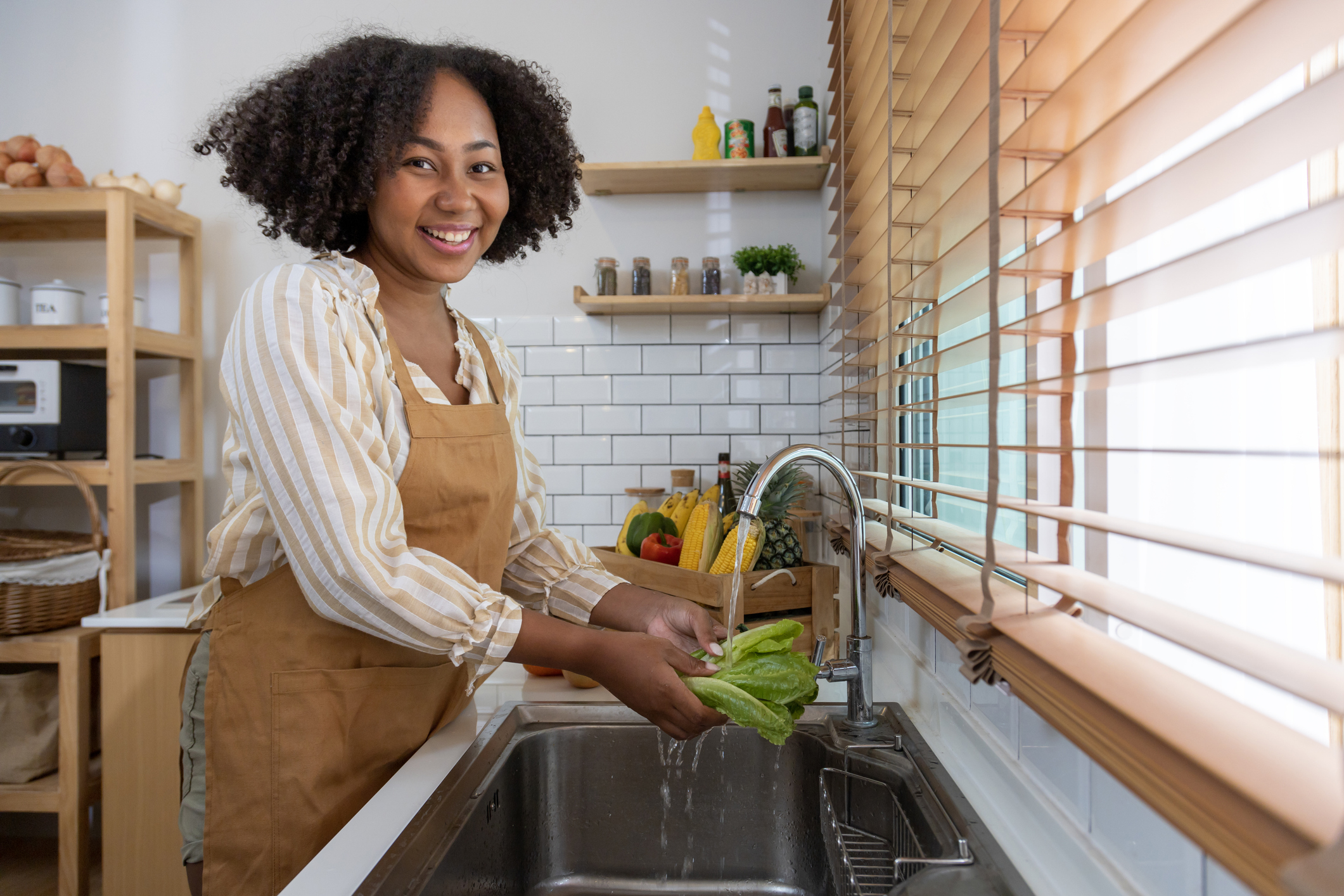 Affordable Quality Water Customer Sarah Washing Veggies